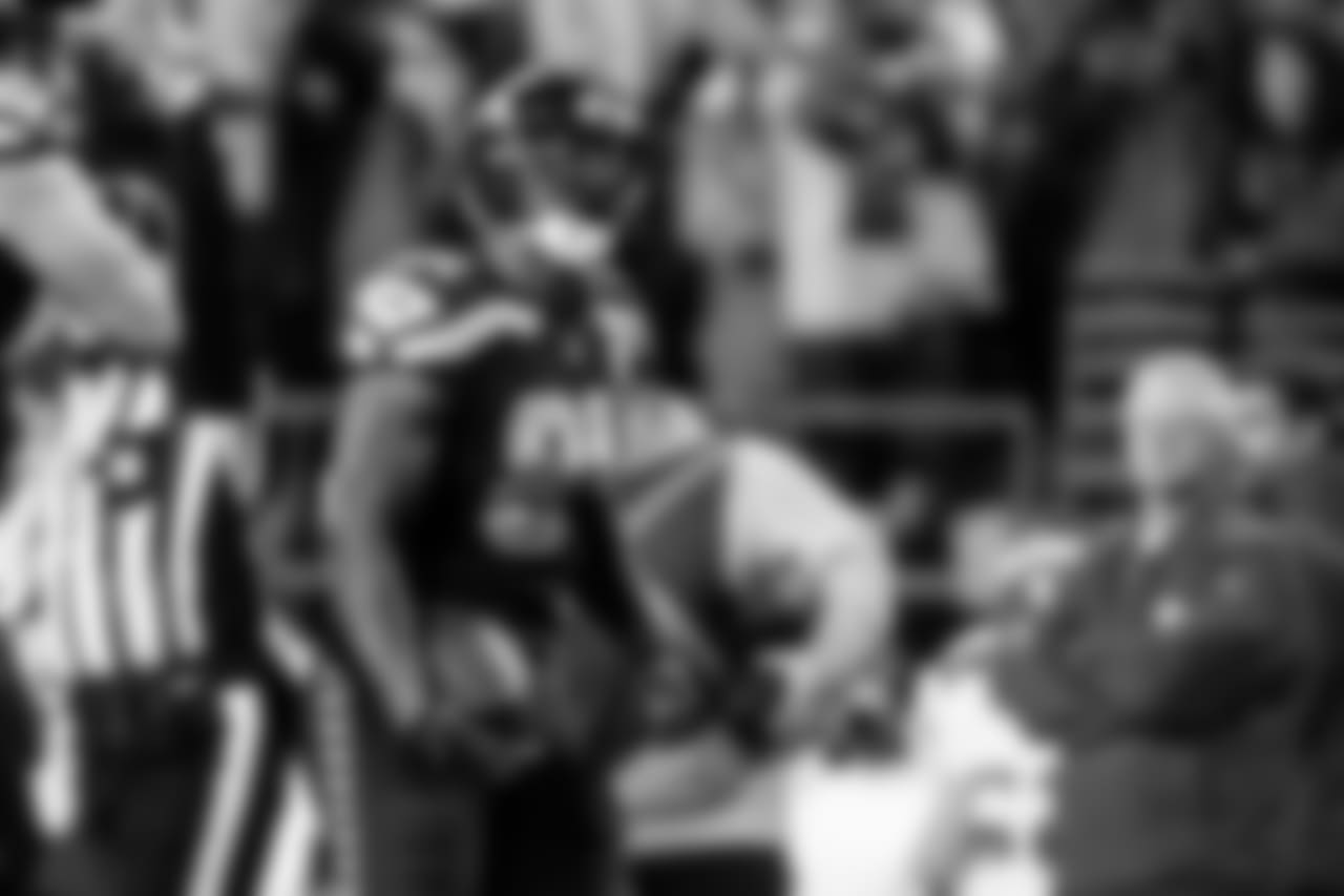 Tight end Ed Dickson reacts after his second effort earned a first down in front of the Chiefs bench.