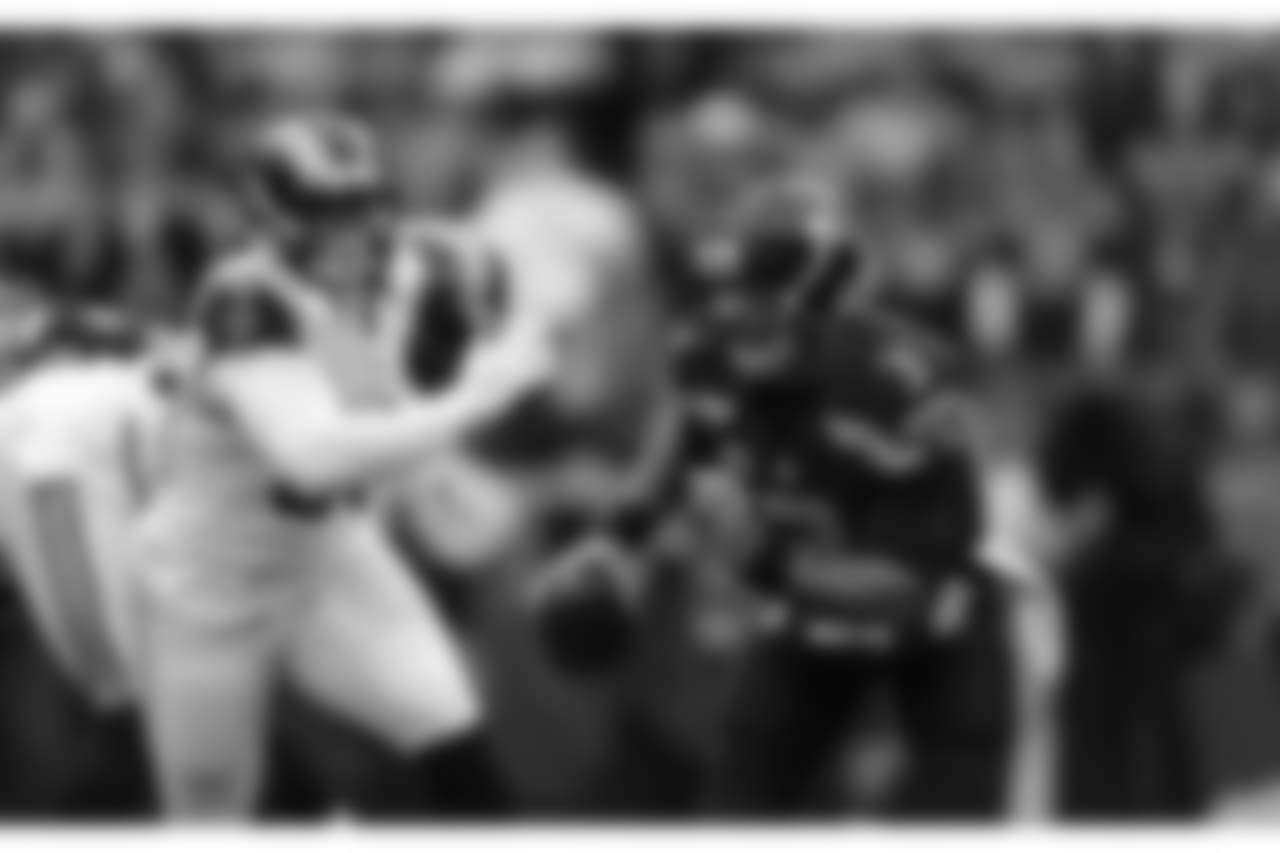 Seattle Seahawks quarterback Russell Wilson (3) scrambles against the St. Louis Rams in the first half of an NFL football game, Sunday, Dec. 27, 2015, in Seattle. (AP Photo/John Froschauer)