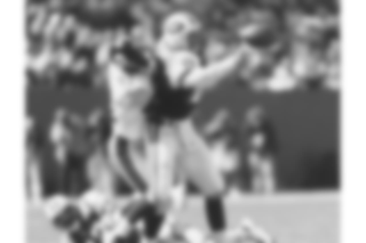 2\. Jason Gildon (94-03) - 77 career QB sacks.