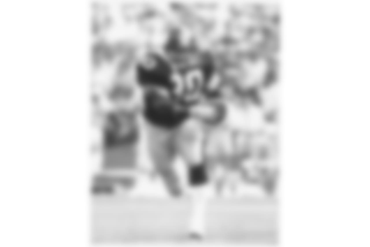 3,989 career rushing yards.