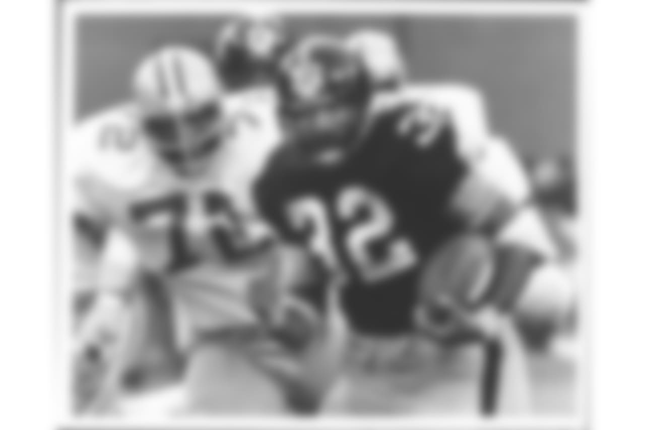 Action photograph of Franco Harris.