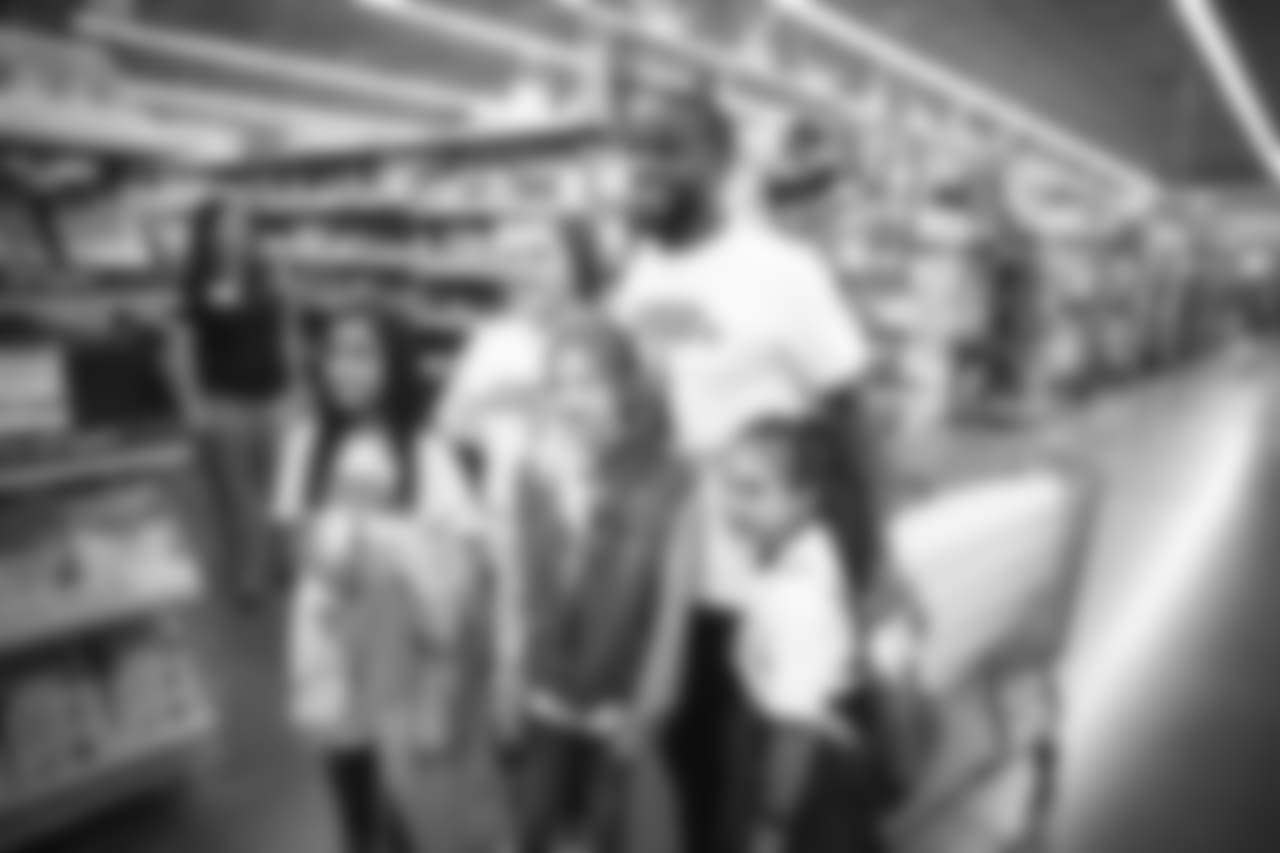 An image of the Dec. 4, 2018 community development event in which Kareem Jackson and his teammates purchased Christmas gifts for Houston-area students.