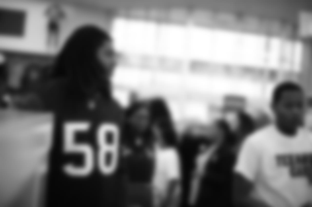 An image from a Dec. 18, 2018 community development event in which Texans rookie players shopped for Christmas gifts with Texans YMCA students.