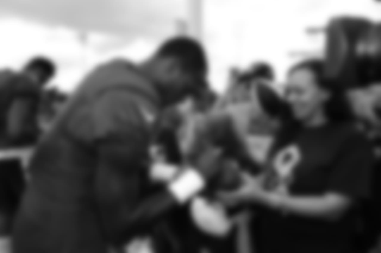 A Nov. 23, 2018 image of a community development event in which military families visited a Texans practice.