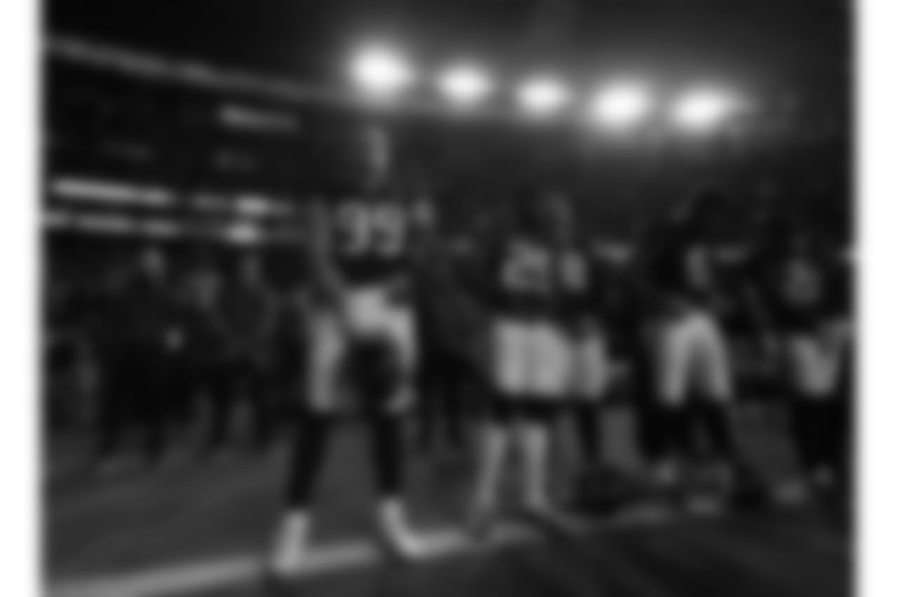 Houston Texans players take part in a tribute to Houston Texans owner Robert "Bob" McNair before an NFL football game against the Tennessee Titans, Monday, Nov. 26, 2018, in Houston. McNair had battled both leukemia and squamous cell carcinoma in recent years before dying in Houston on Friday, Nov. 23, 2018. (AP Photo/David J. Phillip)