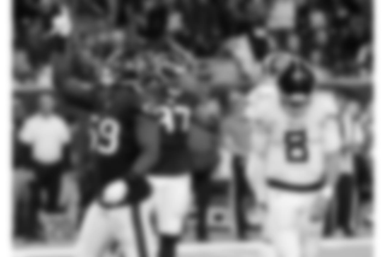 FILE - In this Monday, Nov. 26, 2018, file photo, Houston Texans outside linebacker Whitney Mercilus (59) celebrates after he sacked Tennessee Titans quarterback Marcus Mariota (8) during the second half of an NFL football game in Houston. The Titans have backed themselves into a corner with back-to-back losses, and now they need to fix issues on defense and the offensive line quickly to even have a chance to take advantage of playing four of their final five games at home starting Sunday hosting the Jets. (AP Photo/David J. Phillip, File)