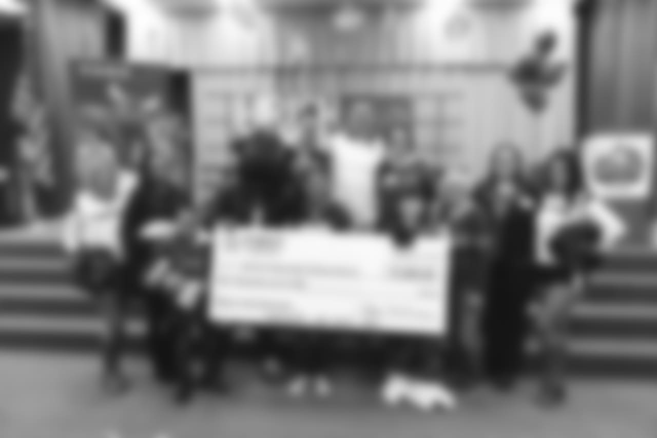 An image from the Nov. 13, 2018 corporate development event at Hirsch Elementary School in Spring, TX. Brian Peters, TORO, and cheerleaders visited the students and presented awards and a big check to teachers.