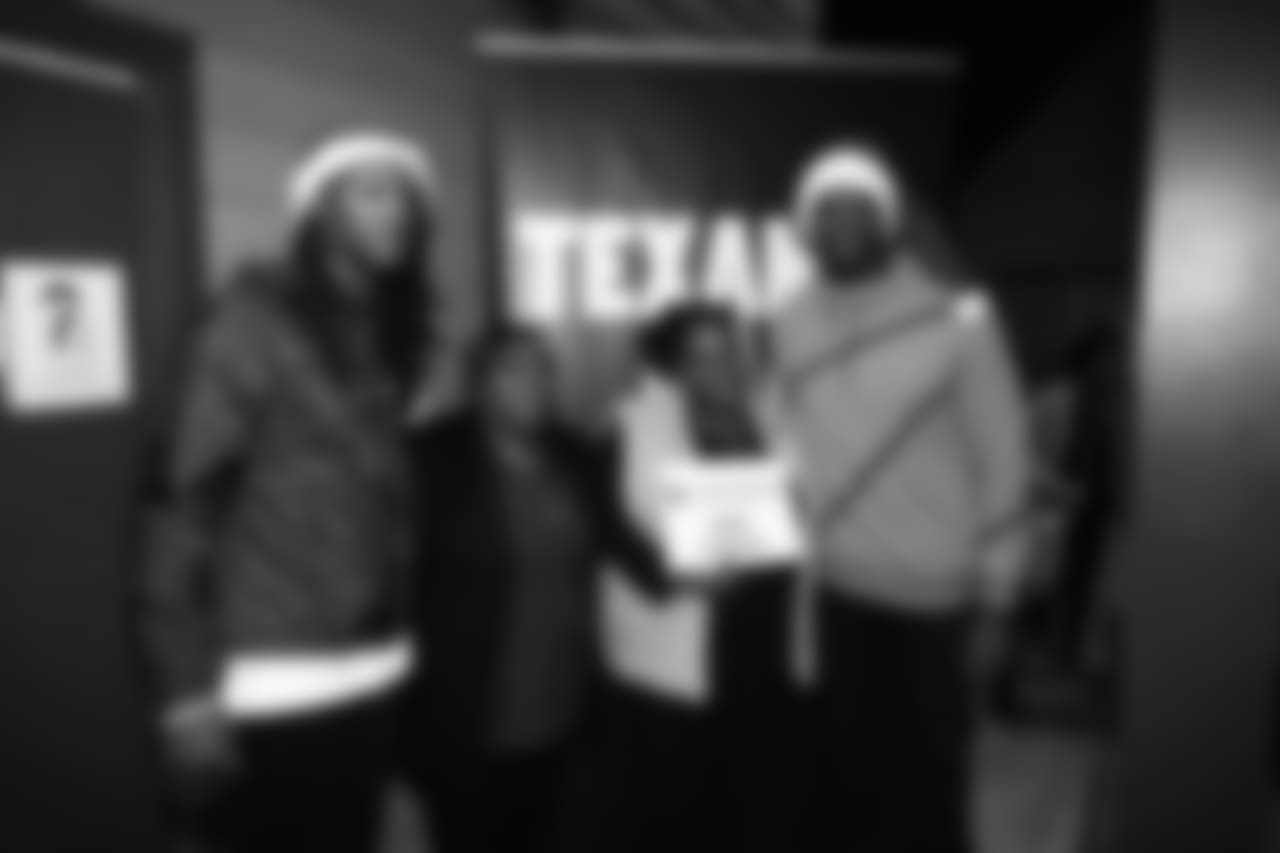 An image from the Dec. 21, 2018 community development event at the Madge Bush Transitional Living Center. Andre Johnson and DeAndre Hopkins gave gifts to families.