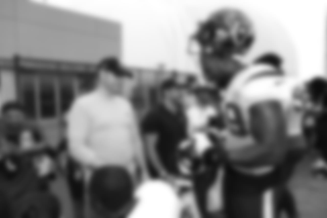 A Nov. 23, 2018 image of a community development event in which military families visited a Texans practice.