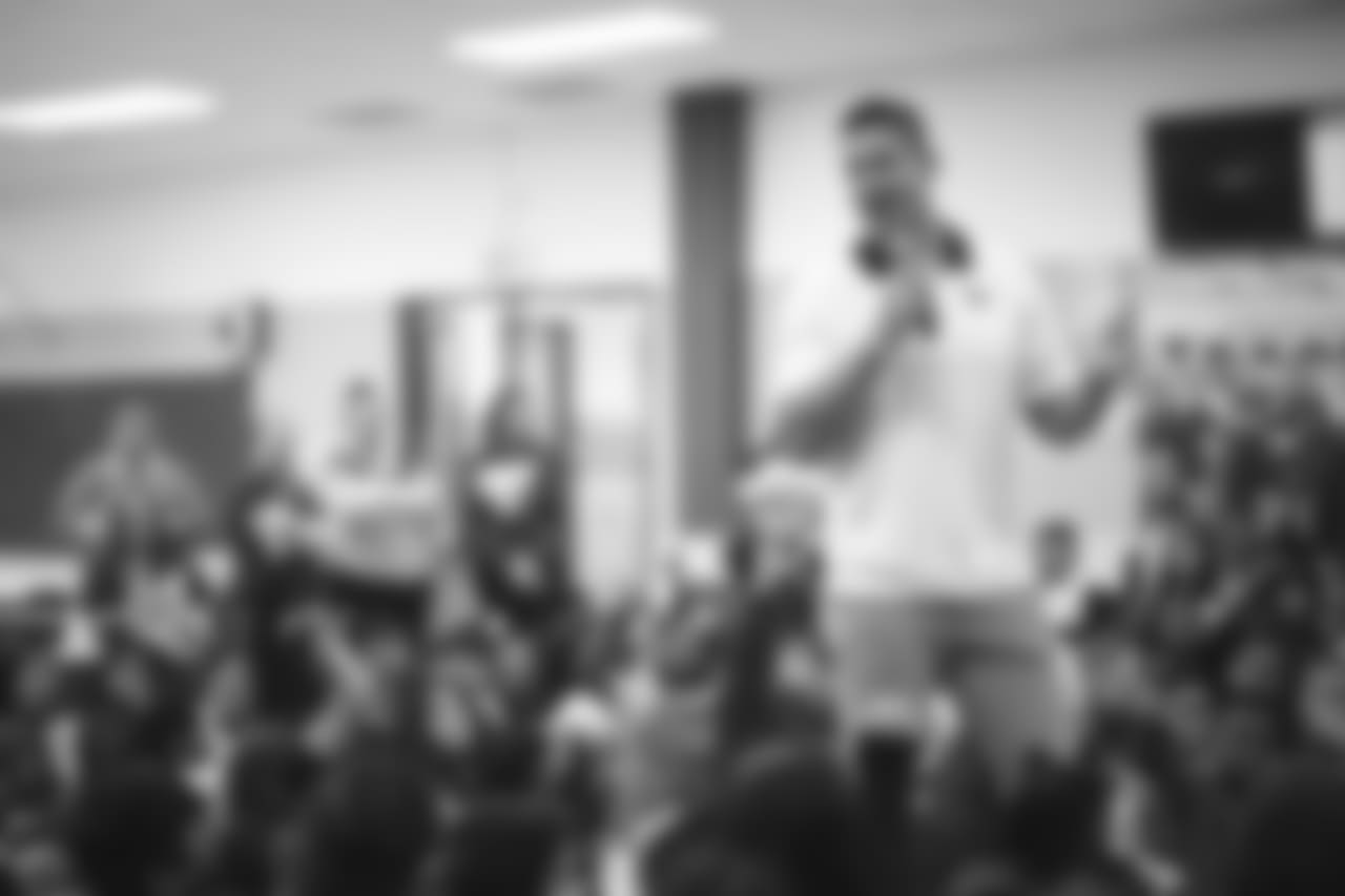 An image from the Nov. 13, 2018 corporate development event at Hirsch Elementary School in Spring, TX. Brian Peters, TORO, and cheerleaders visited the students and presented awards and a big check to teachers.