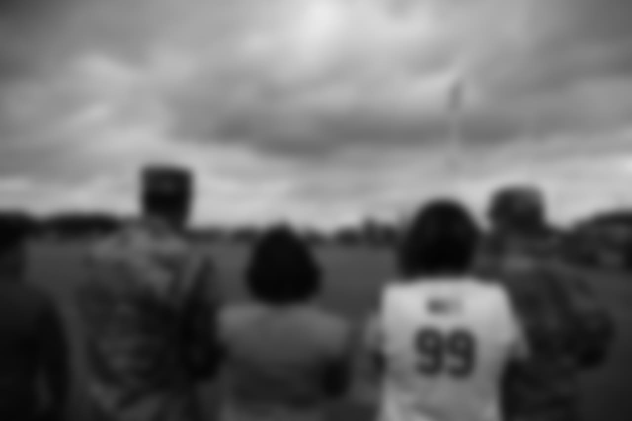A Nov. 23, 2018 image of a community development event in which military families visited a Texans practice.
