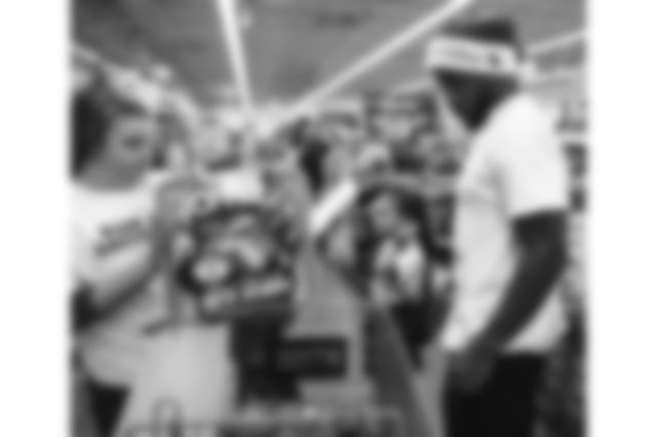 An image of the Dec. 4, 2018 community development event in which Kareem Jackson and his teammates purchased Christmas gifts for Houston-area students.