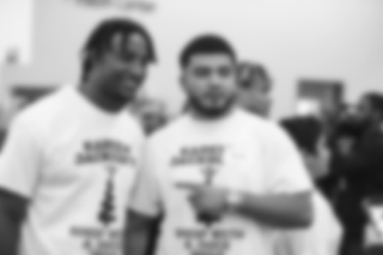 An image of the Dec. 4, 2018 community development event in which Kareem Jackson and his teammates purchased Christmas gifts for Houston-area students.