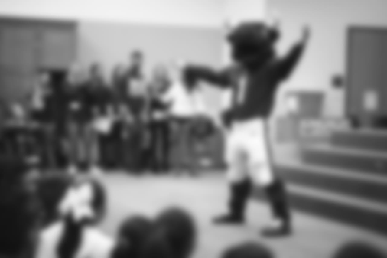 An image from the Nov. 13, 2018 corporate development event at Hirsch Elementary School in Spring, TX. Brian Peters, TORO, and cheerleaders visited the students and presented awards and a big check to teachers.