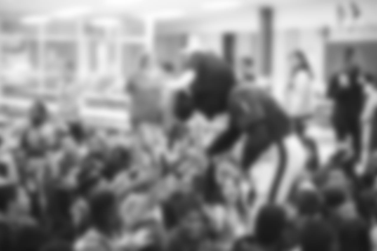 An image from the Nov. 13, 2018 corporate development event at Hirsch Elementary School in Spring, TX. Brian Peters, TORO, and cheerleaders visited the students and presented awards and a big check to teachers.