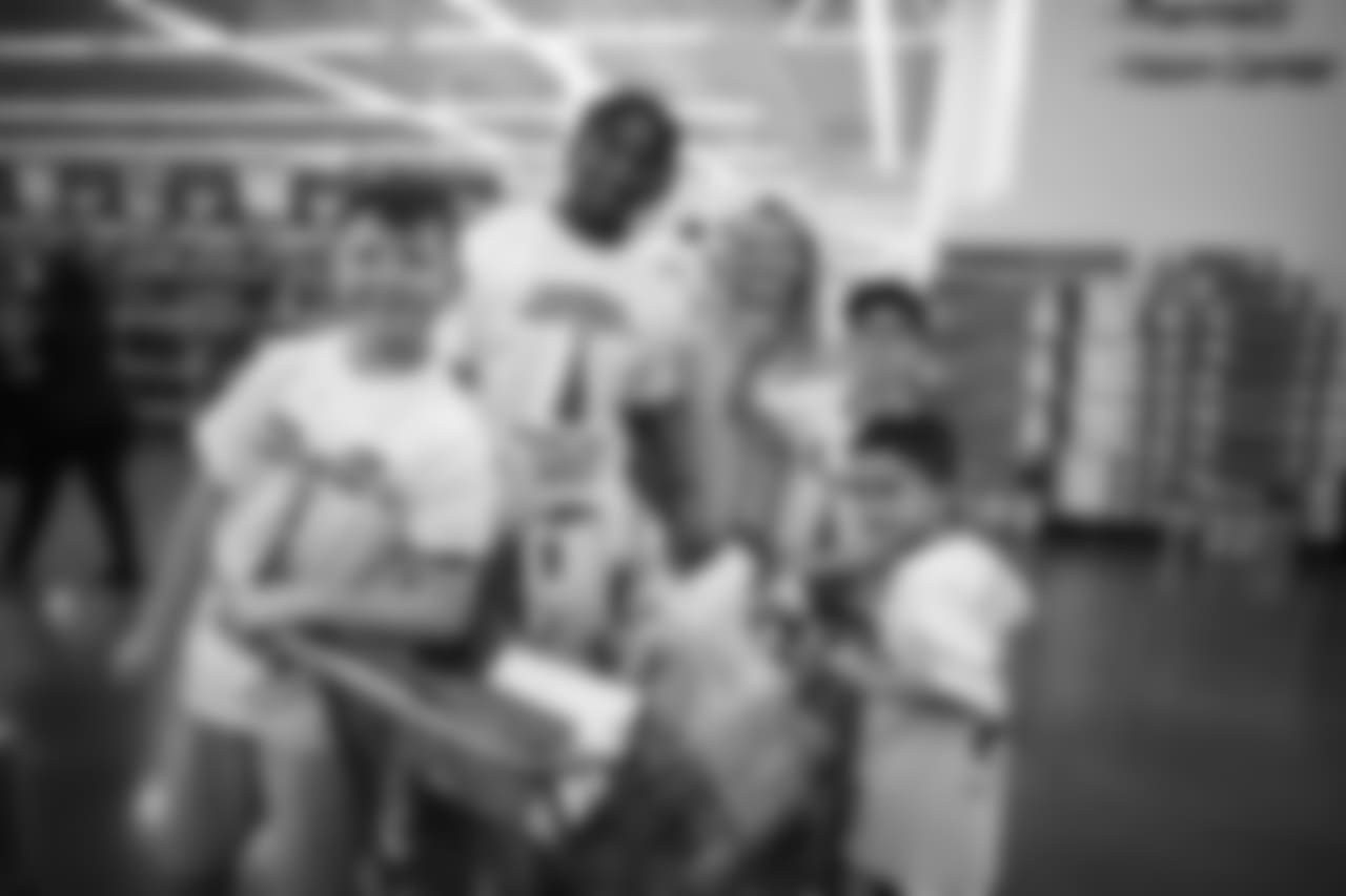An image of the Dec. 4, 2018 community development event in which Kareem Jackson and his teammates purchased Christmas gifts for Houston-area students.