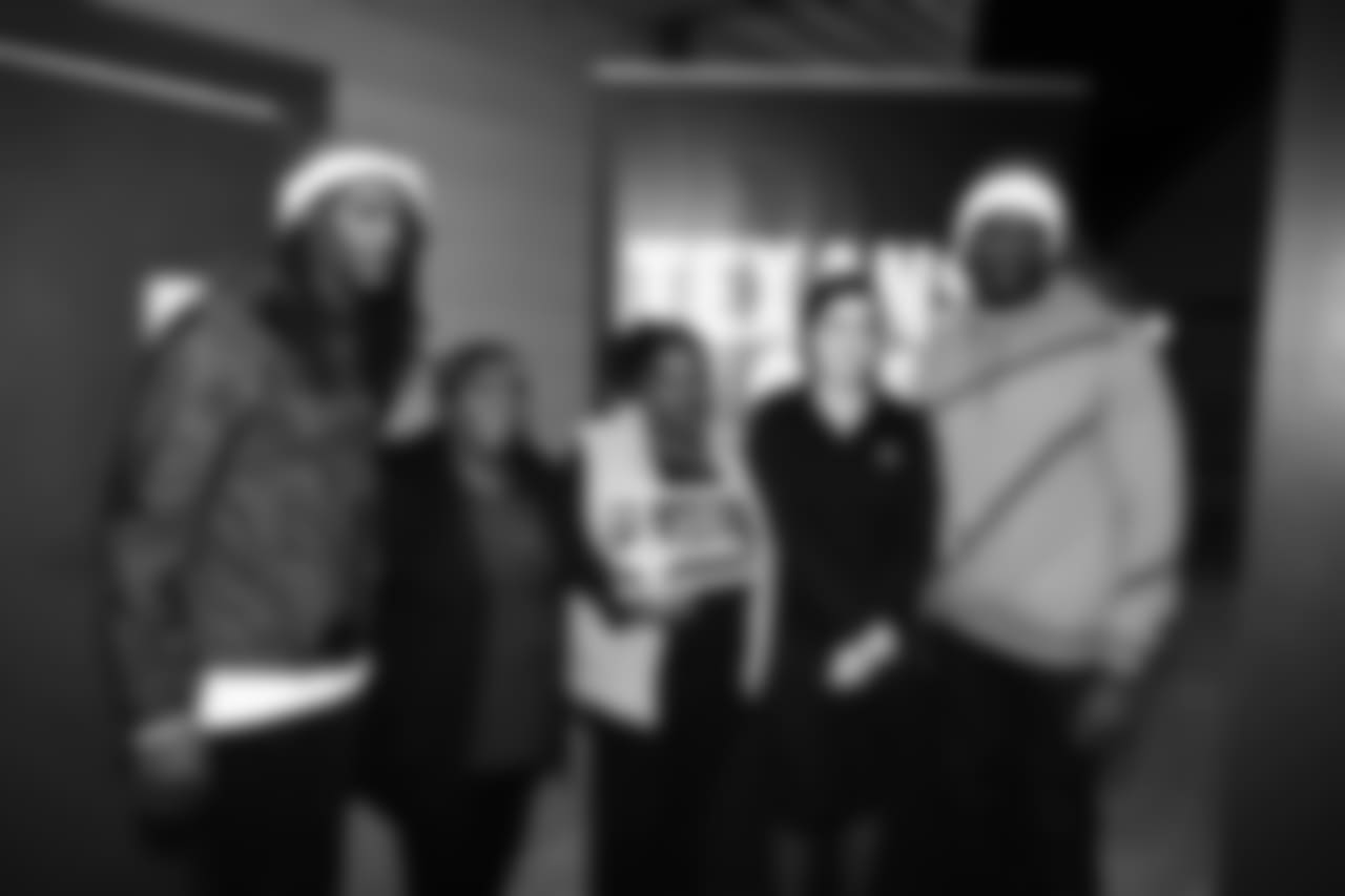 An image from the Dec. 21, 2018 community development event at the Madge Bush Transitional Living Center. Andre Johnson and DeAndre Hopkins gave gifts to families.