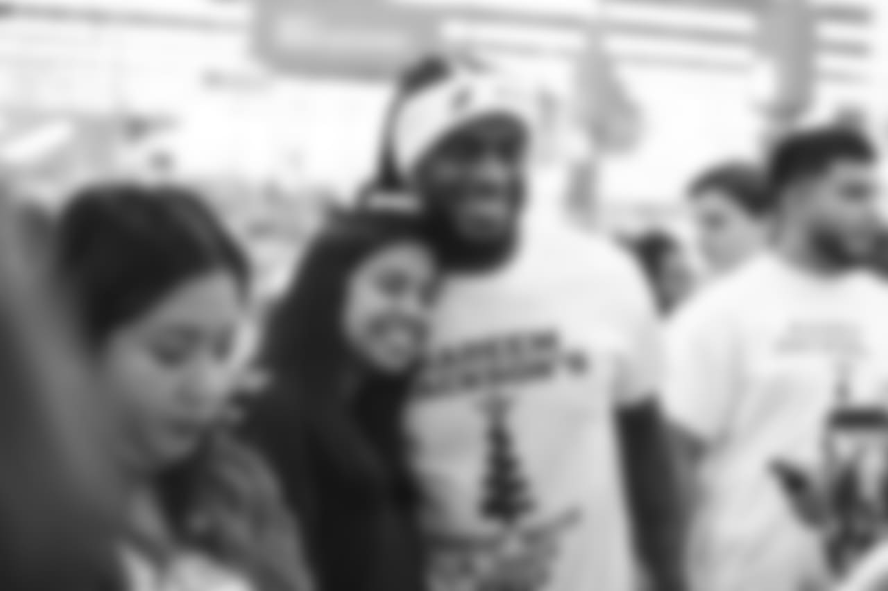 An image of the Dec. 4, 2018 community development event in which Kareem Jackson and his teammates purchased Christmas gifts for Houston-area students.