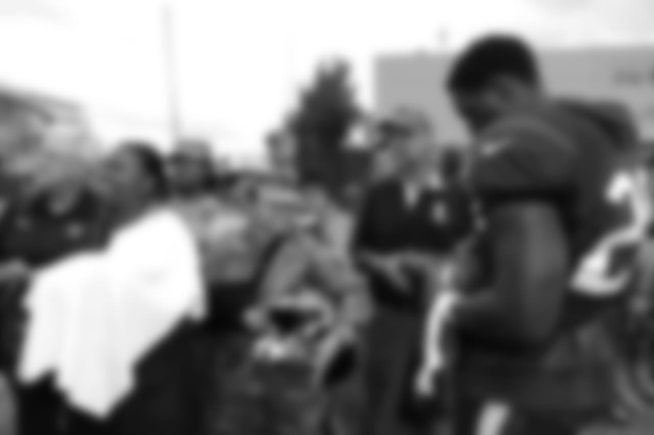 A Nov. 23, 2018 image of a community development event in which military families visited a Texans practice.