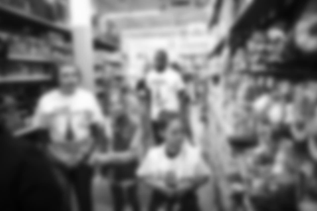 An image of the Dec. 4, 2018 community development event in which Kareem Jackson and his teammates purchased Christmas gifts for Houston-area students.