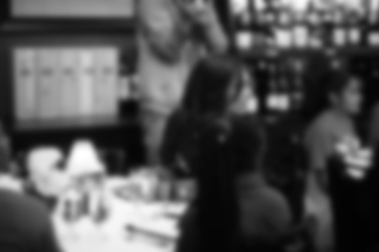 An image from the Oct. 18, 2018 community development event in which the Lady Texans learned about dinner ettiequte with Houston-area students.