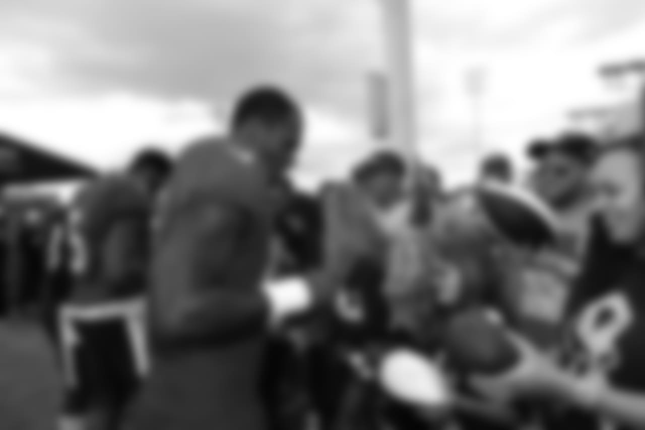 A Nov. 23, 2018 image of a community development event in which military families visited a Texans practice.