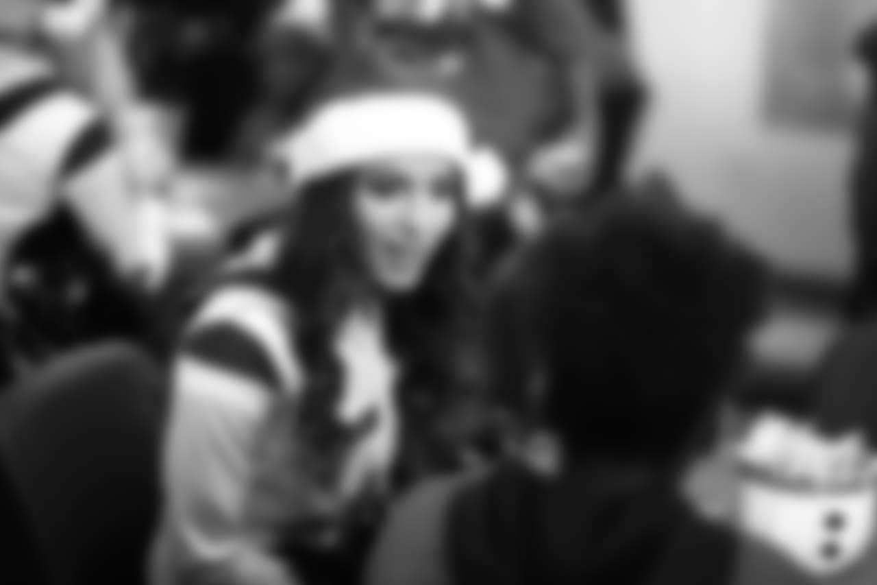 An image from the Dec. 20 2018 community development event. The Lady Texans threw a Holiday Party for the Texans YMCA at NRG Stadium.