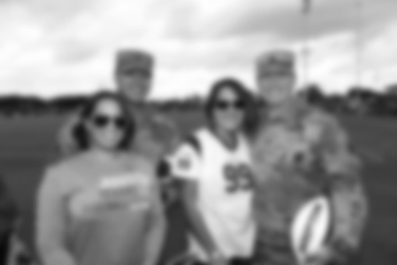 A Nov. 23, 2018 image of a community development event in which military families visited a Texans practice.
