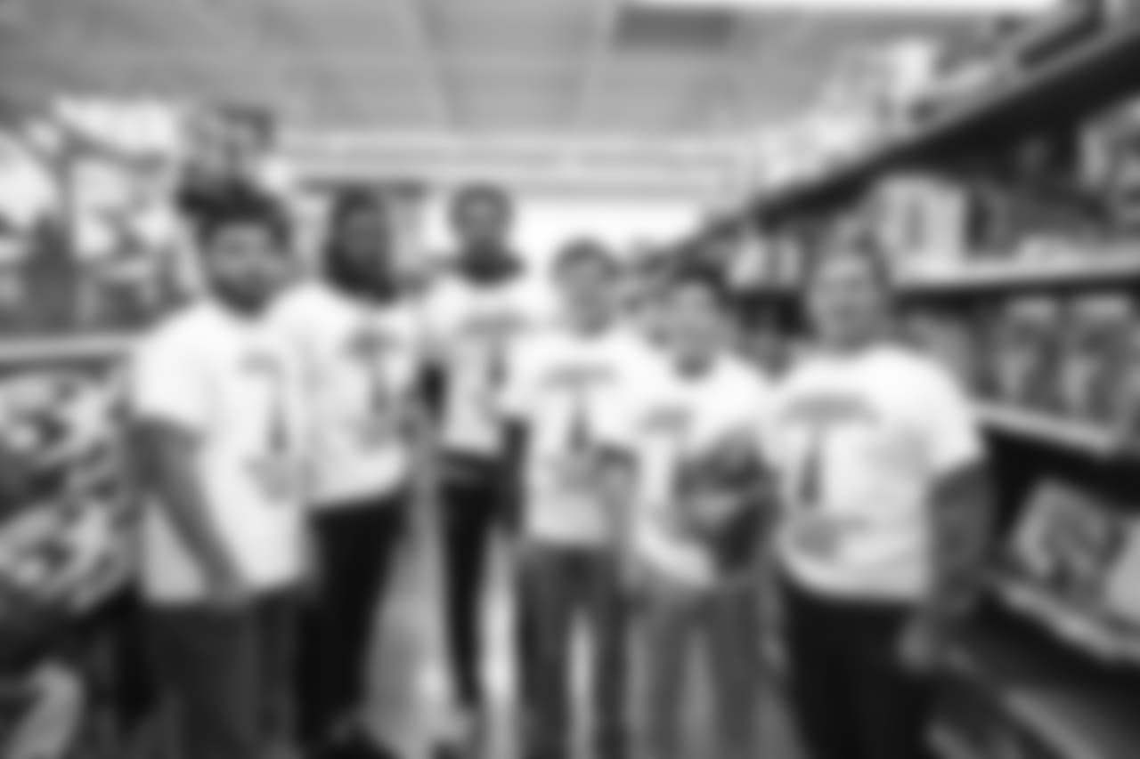 An image of the Dec. 4, 2018 community development event in which Kareem Jackson and his teammates purchased Christmas gifts for Houston-area students.