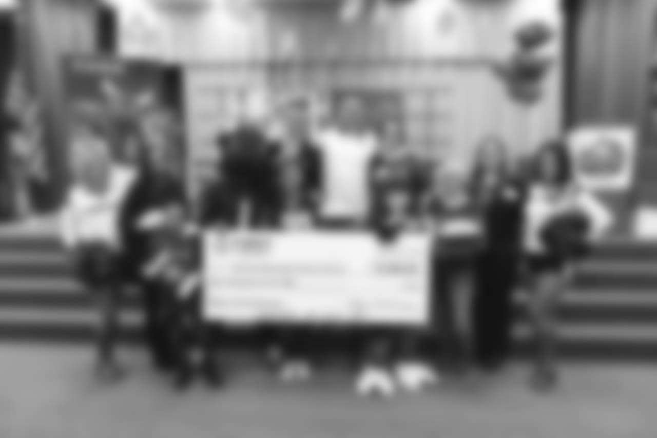 An image from the Nov. 13, 2018 corporate development event at Hirsch Elementary School in Spring, TX. Brian Peters, TORO, and cheerleaders visited the students and presented awards and a big check to teachers.