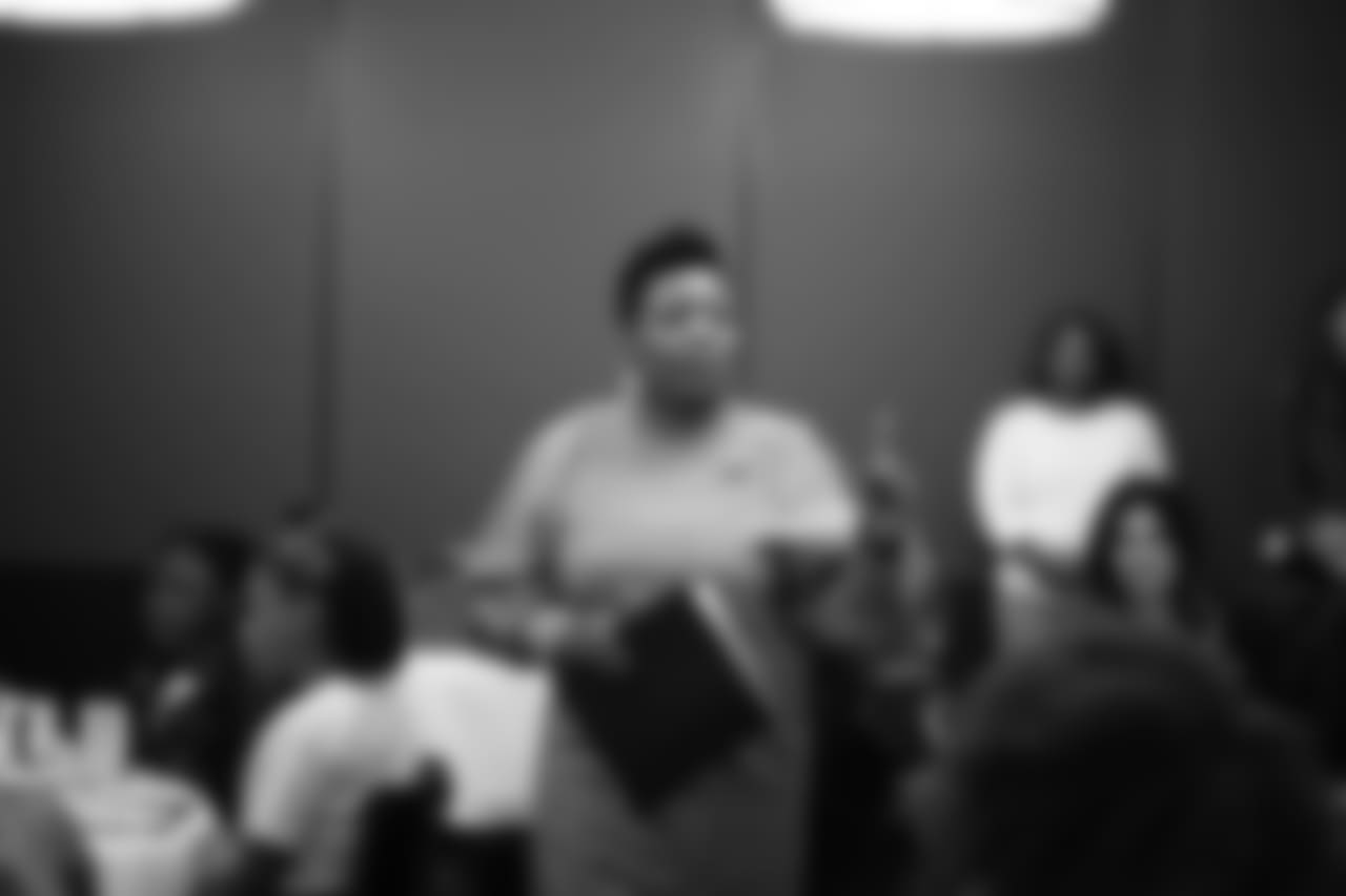 An image from the Oct. 18, 2018 community development event in which the Lady Texans learned about dinner ettiequte with Houston-area students.