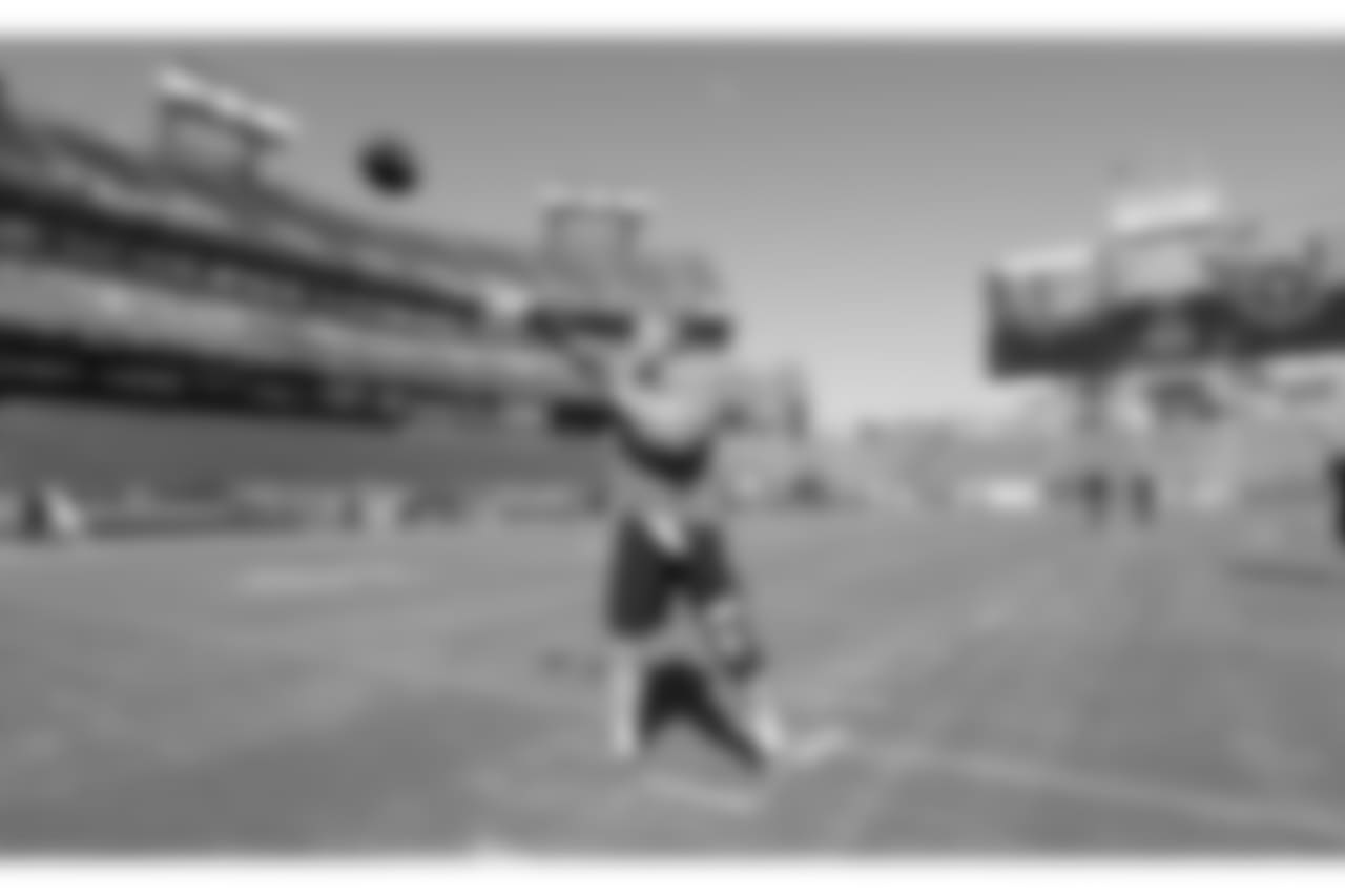 Philadelphia Eagles quarterback Carson Wentz warms up before an NFL football game against the Tennessee Titans Sunday, Sept. 30, 2018, in Nashville, Tenn. (AP Photo/Mark Zaleski)