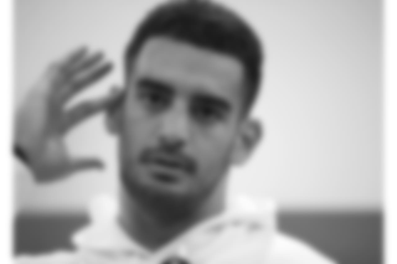 Tennessee Titans quarterback Marcus Mariota (8) gestures during a press conference after an NFL football game against Los Angeles Chargers at Wembley stadium in London, Sunday, Oct. 21, 2018. Chargers won the match 20-19. (AP Photo/Matt Dunham)