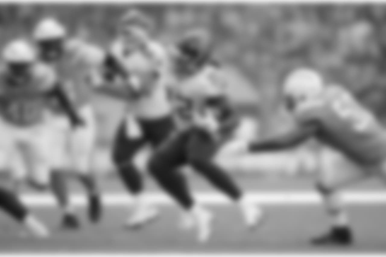 FILE - In this Oct. 21, 2018, file photo, Tennessee Titans running back Derrick Henry (22) carries the ball during an NFL football game against the Los Angeles Chargers in London. Henry has talked a very good game on the kind of running back he wants to be for the Titans. The 2015 Heisman Trophy winner knows it's time he starts proving it. (AP Photo/Matt Dunham, File)