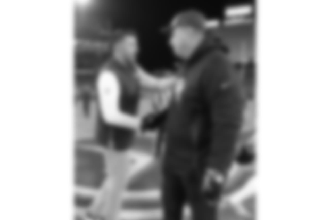 Jacksonville Jaguars head coach Doug Marrone, right, and Tennessee Titans head coach Mike Vrabel speak before the first half of an NFL football game, Thursday, Dec. 6, 2018, in Nashville, Tenn. (AP Photo/Mark Zaleski)