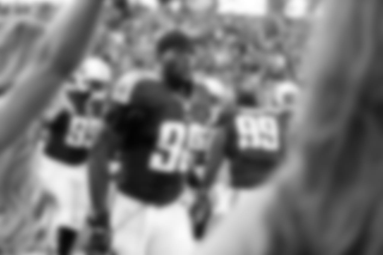 Tennessee Titans linebacker Brian Orakpo (98) runs onto the field for the first half of a preseason NFL football game against the St. Louis Rams Sunday, Aug. 23, 2015, in Nashville, Tenn. (AP Photo/Weston Kenney)