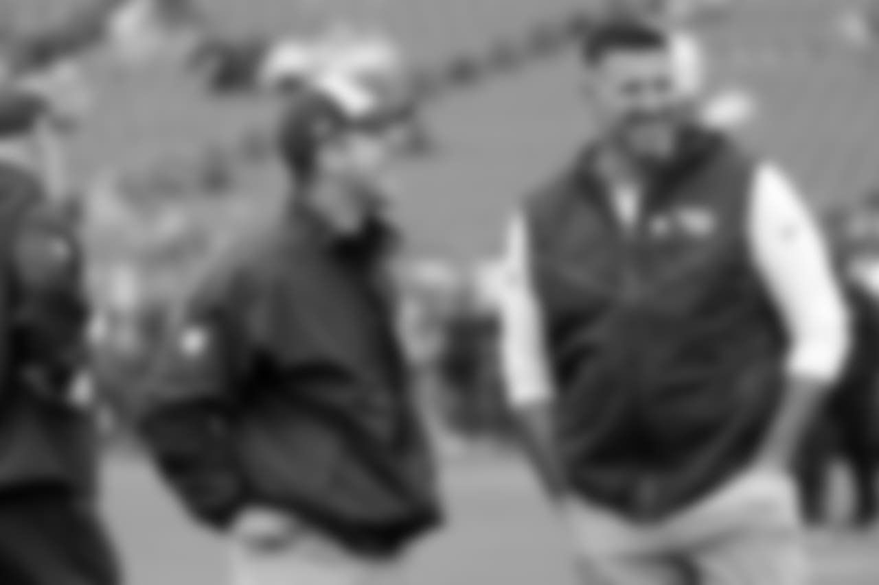 Baltimore Ravens head coach John Harbaugh, left, talks with Tennessee Titans head coach Mike Vrabel before an NFL football game Sunday, Oct. 14, 2018, in Nashville, Tenn. (AP Photo/James Kenney)