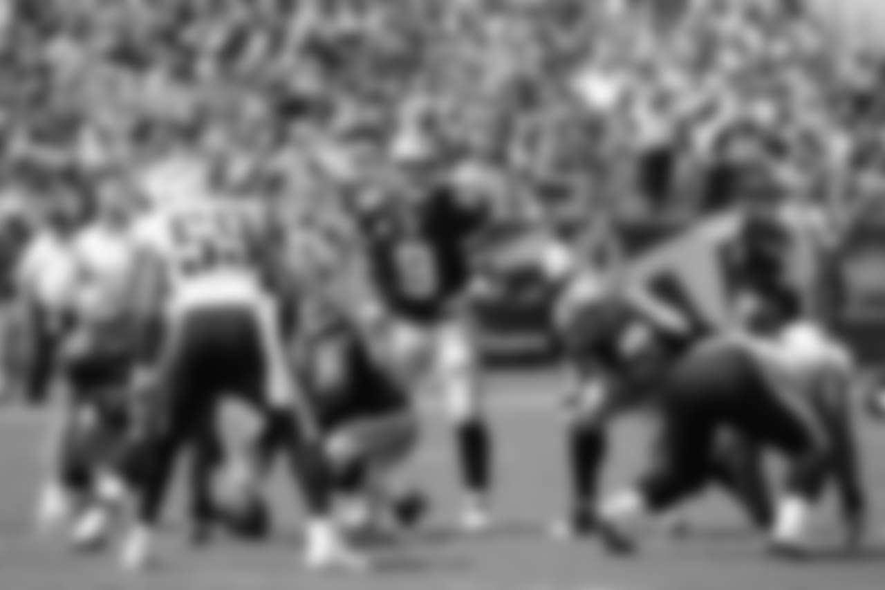 Dallas Cowboys quarterback Tony Romo (9) calls a play against the Tennessee Titans in the second quarter of an NFL football game Sunday, Sept. 14, 2014, in Nashville, Tenn. (AP Photo/Mark Zaleski)