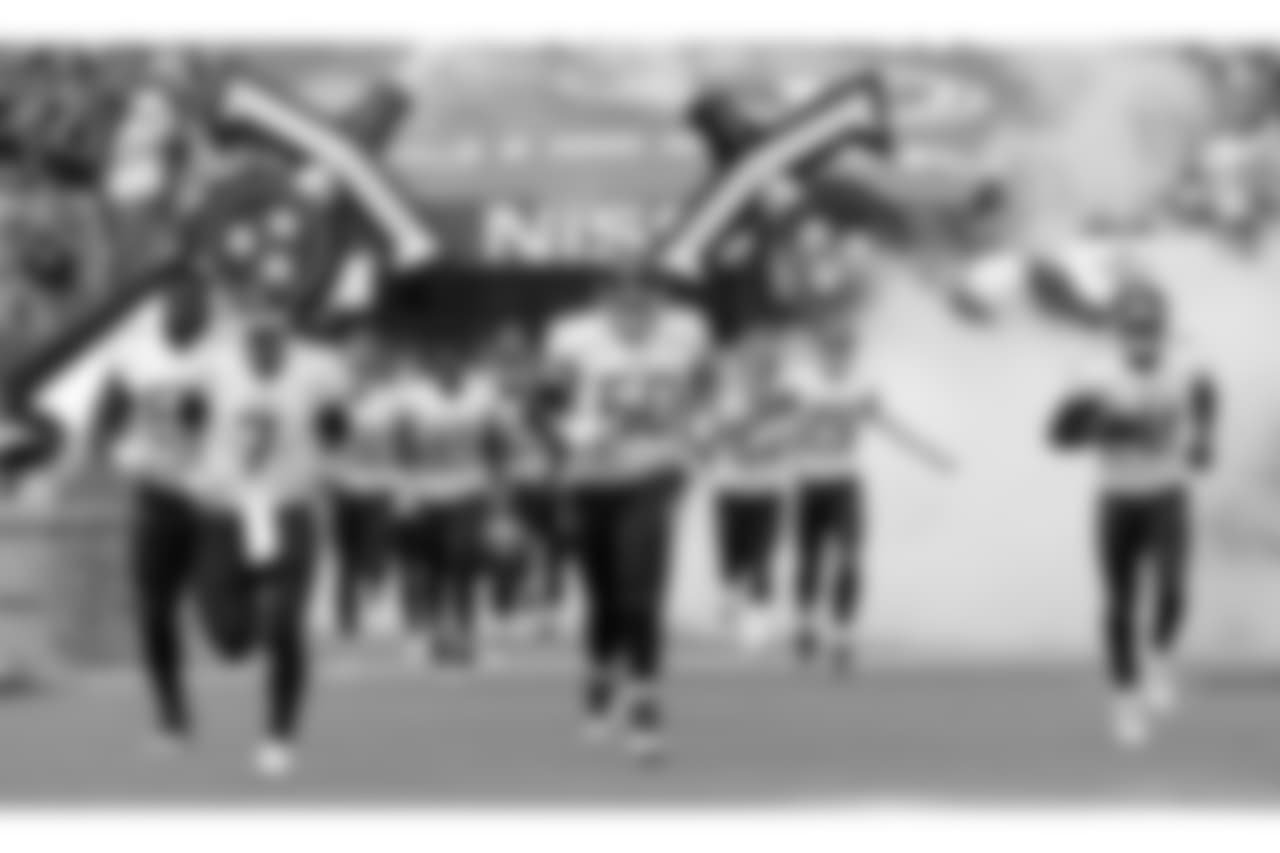 Tennessee Titans players take the field before an NFL football game against the Houston Texans Sunday, Sept. 16, 2018, in Nashville, Tenn. (AP Photo/Mark Zaleski)