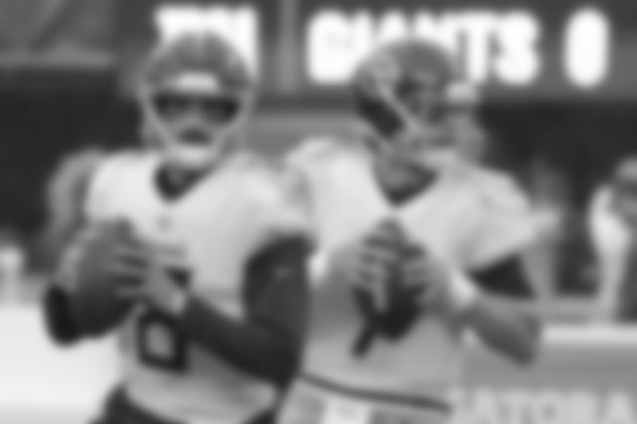 Tennessee Titans quarterback Marcus Mariota (8) and quarterback Blaine Gabbert (7) work out prior to an NFL football game against the New York Giants, Sunday, Dec. 16, 2018, in East Rutherford, N.J. (AP Photo/Bill Kostroun)