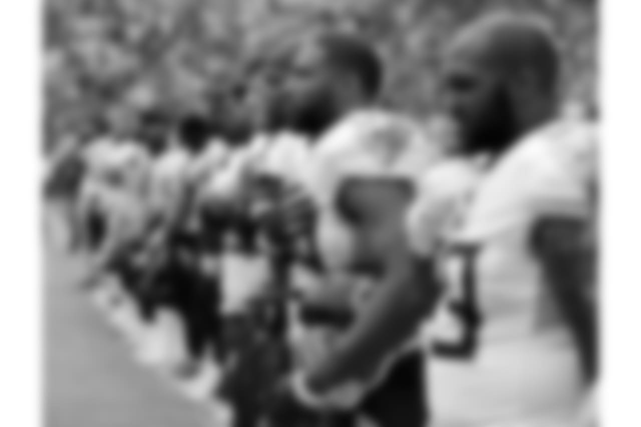 Tennessee Titans linebacker Wesley Woodyard (59) stands for the national anthem before an NFL football game against the Houston Texans Sunday, Sept. 16, 2018, in Nashville, Tenn. (AP Photo/James Kenney)
