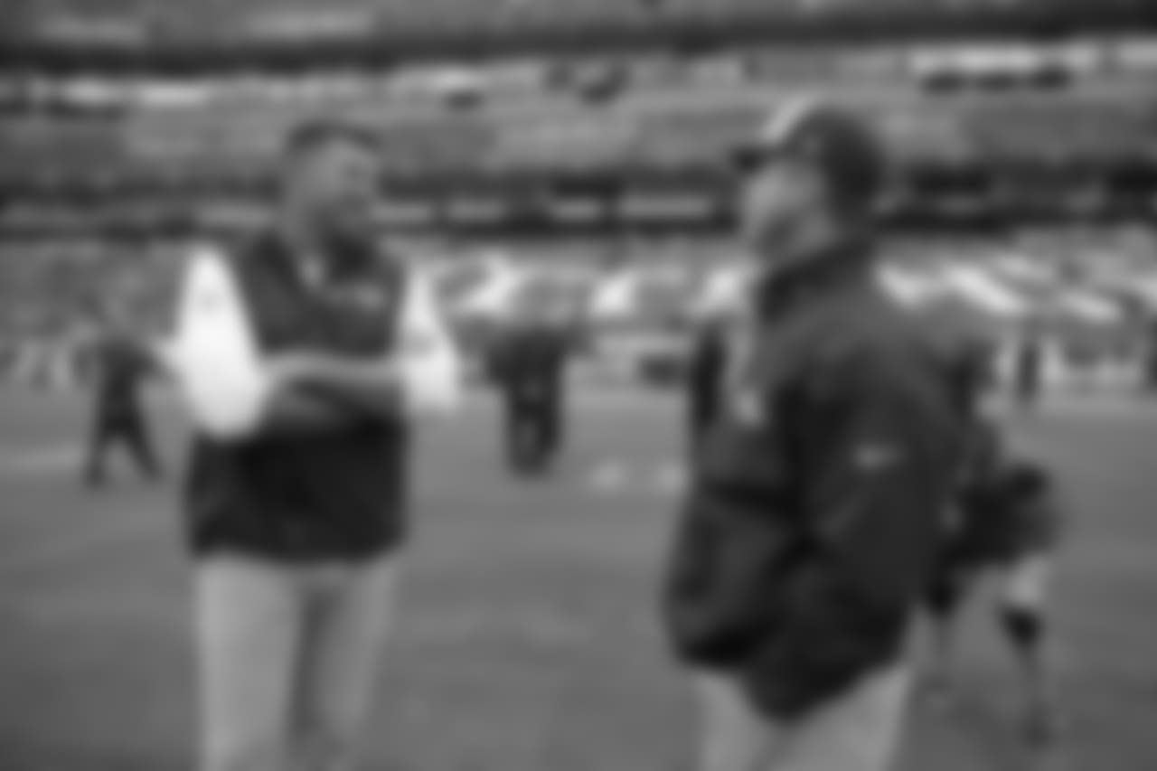 Tennessee Titans head coach Mike Vrabel, left, and Baltimore Ravens head coach John Harbaugh talk before an NFL football game Sunday, Oct. 14, 2018, in Nashville, Tenn. (AP Photo/James Kenney)