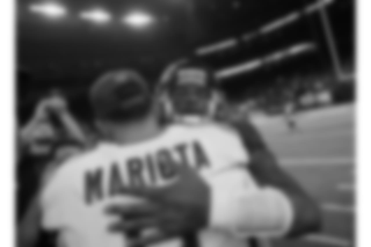 Tennessee Titans quarterback Marcus Mariota (8) and Houston Texans quarterback Deshaun Watson (4) greet on the field after an NFL football game, Monday, Nov. 26, 2018, in Houston. (AP Photo/David J. Phillip)