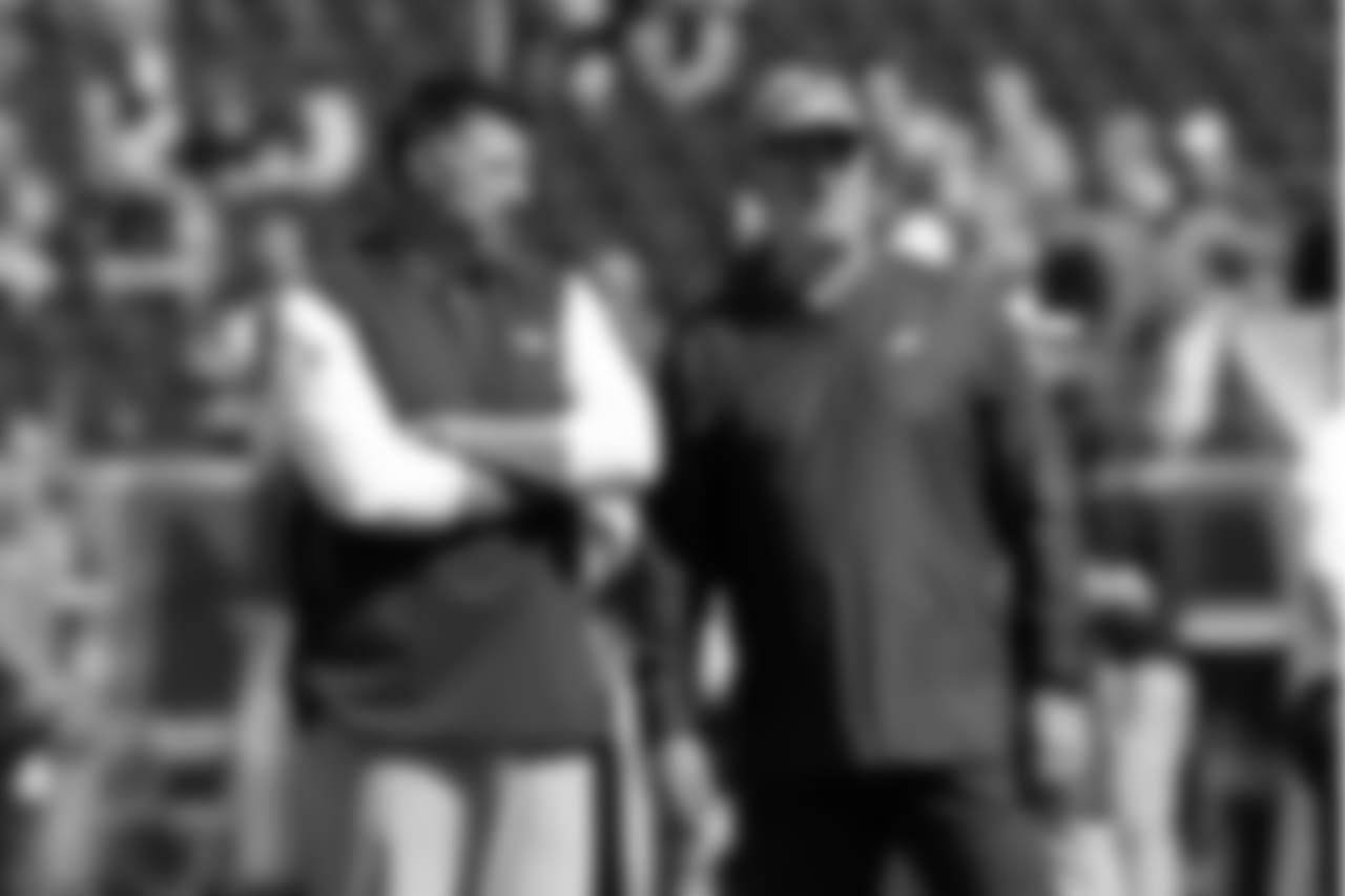 Tennessee Titans head coach Mike Vrabel, left, and Philadelphia Eagles head coach Doug Pederson talk before an NFL football game Sunday, Sept. 30, 2018, in Nashville, Tenn. (AP Photo/Mark Zaleski)