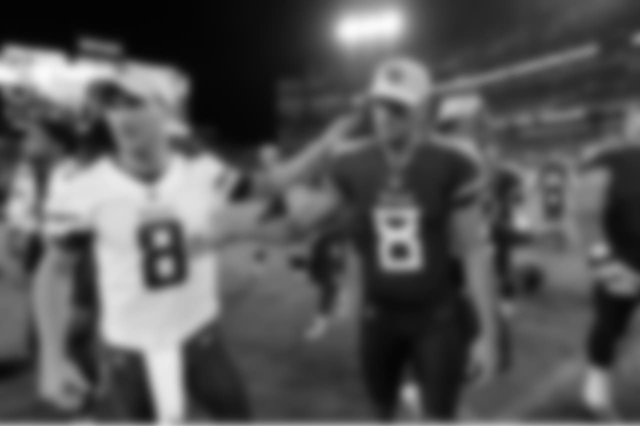 Minnesota Vikings quarterback Kirk Cousins, left, shakes hands with Tennessee Titans quarterback Marcus Mariota, right, after a preseason NFL football game Thursday, Aug. 30, 2018, in Nashville, Tenn. The Vikings won 13-3. (AP Photo/Mark Zaleski)