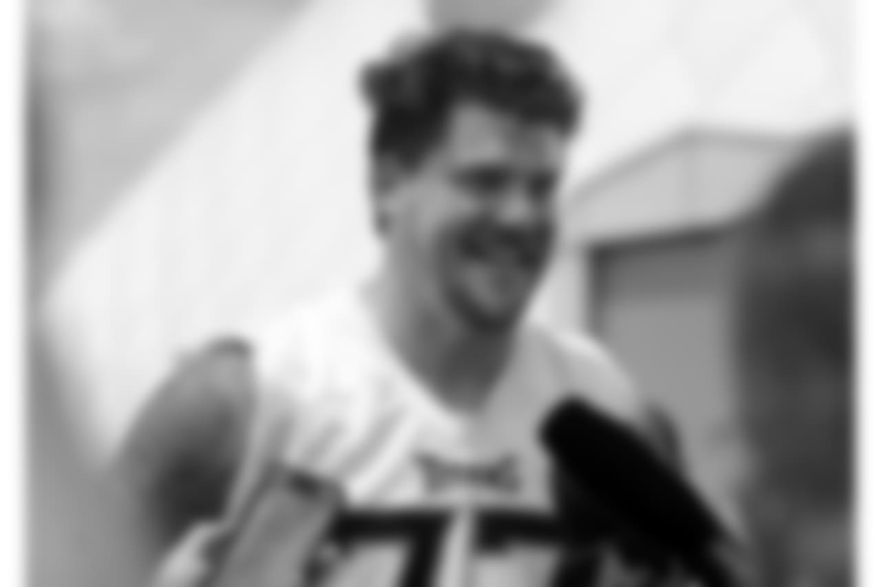 Tennessee Titans offensive tackle Taylor Lewan answers questions after NFL football training camp Thursday, July 26, 2018, in Nashville, Tenn. (AP Photo/Mark Humphrey)