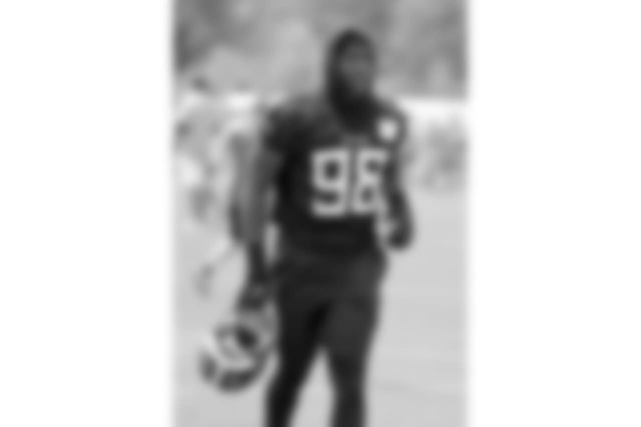 Tennessee Titans linebacker Brian Orakpo leaves the field after NFL football training camp Thursday, July 26, 2018, in Nashville, Tenn. (AP Photo/Mark Humphrey)