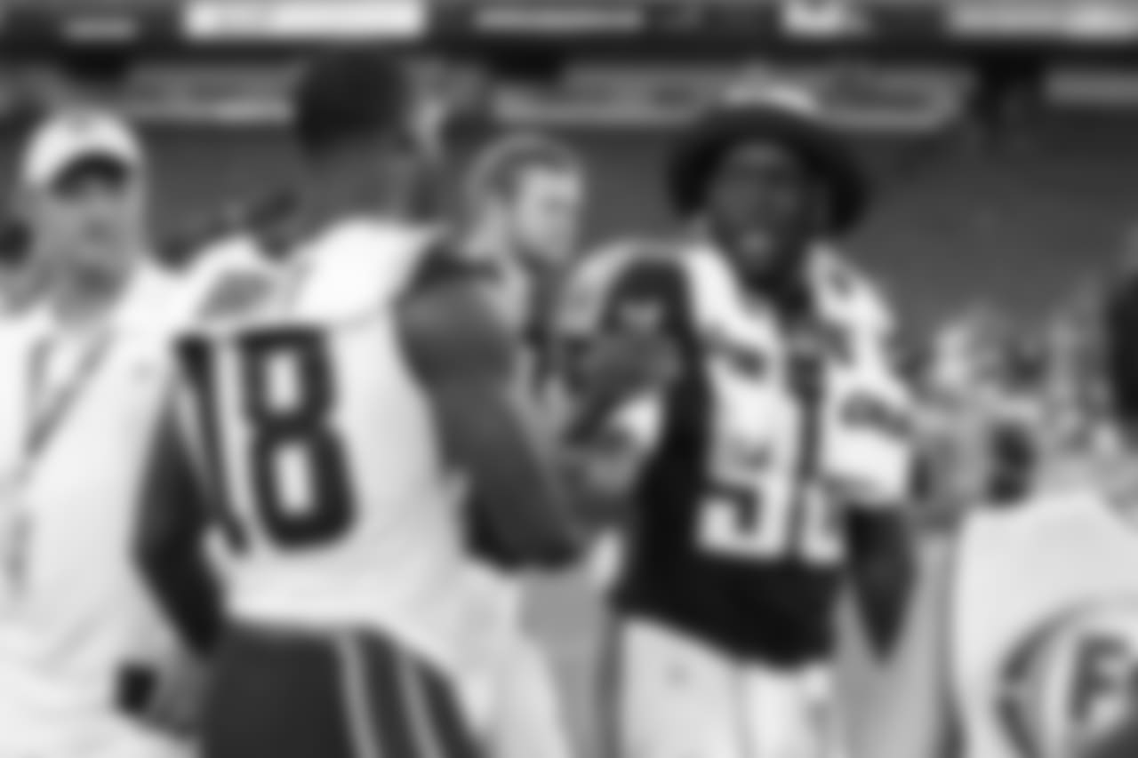 St. Louis Rams wide receiver Kenny Britt (18) shakes hands with Tennessee Titans linebacker Brian Orakpo (98) after a preseason NFL football game Sunday, Aug. 23, 2015, in Nashville, Tenn. The Titans won 27-14. (AP Photo/Weston Kenney)