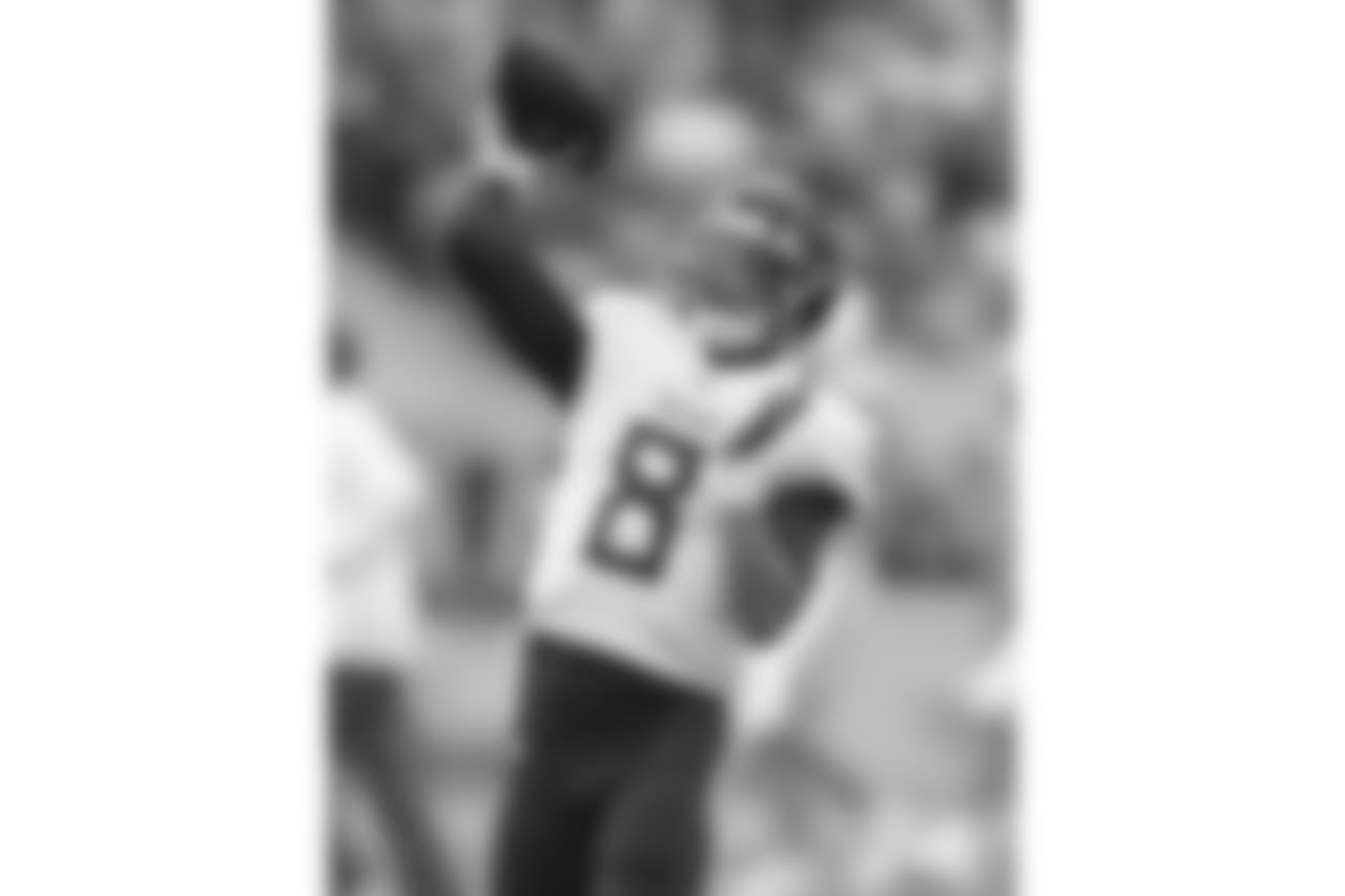 Tennessee Titans quarterback Marcus Mariota (8) passes the ball during the warm-up before an NFL football game against Los Angeles Chargers at Wembley stadium in London, Sunday, Oct. 21, 2018. (AP Photo/Matt Dunham)