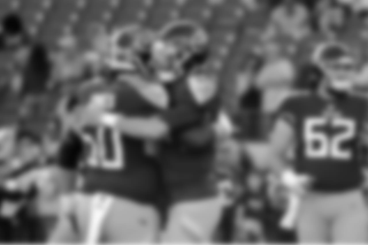 Tennessee Titans quarterback Marcus Mariota (8) hugs center Ben Jones (60) before an NFL football game against the New York Jets Sunday, Dec. 2, 2018, in Nashville, Tenn. (AP Photo/James Kenney)